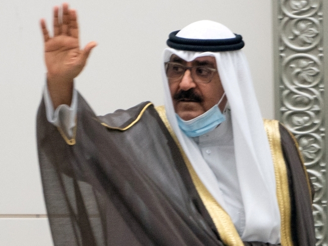 Kuwait's newly appointed crown prince Sheikh Meshal al-Ahmad Al-Jaber al-Sabah waves before he is sworn in, at the parliament, in Kuwait City, Kuwait October 8, 2020. REUTERS/Stephanie McGehee/File Photo