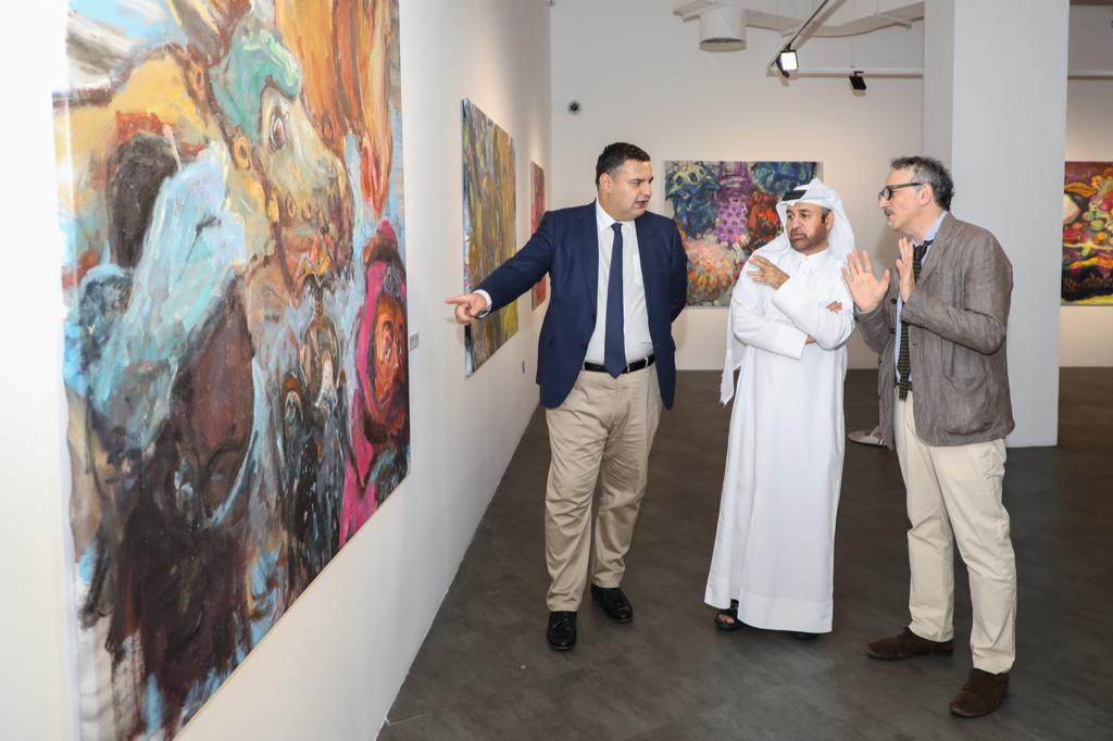 Katara General Manager, Prof. Dr. Khalid bin Ibrahim Al Sulaiti (center), Georgian Ambassador to Qatar, H E Nikoloz Revazishvili (left), and Georgian artist Gela Patiashvili (right), during the opening of “Forms of Life” art exhibition at Katara.