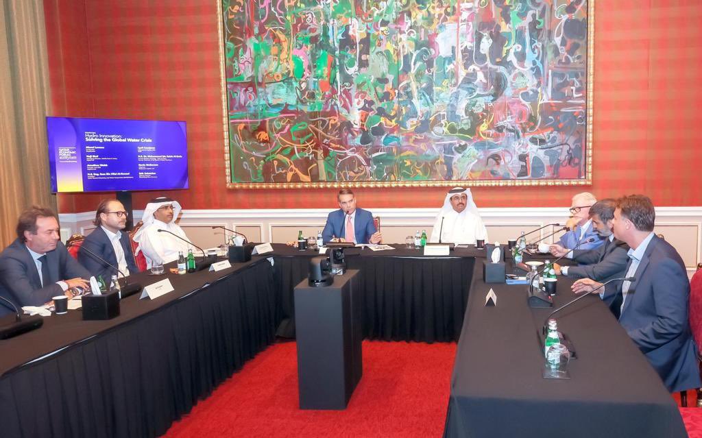 H E Dr. Mohammed bin Saleh Al Sada (fourth right) and Kahramaa President Eng Essa bin Hilal Al Kuwari (third left) with other panellists during a roundtable discussion at Qatar Economic Forum, yesterday.