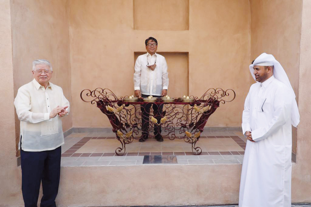 Katara General Manager, Dr. Khalid bin Ibrahim Al Sulaiti (right) Philippine Ambassador, H E Alan Timbaya (left), and Filipino artist Frederick Epistola during the inauguration of Philippine corner at Katara.