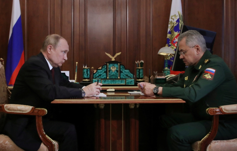 Russian President Vladimir Putin attends a meeting with Defence Minister Sergei Shoigu in Moscow, Russia, July 4, 2022. (Reuters)

