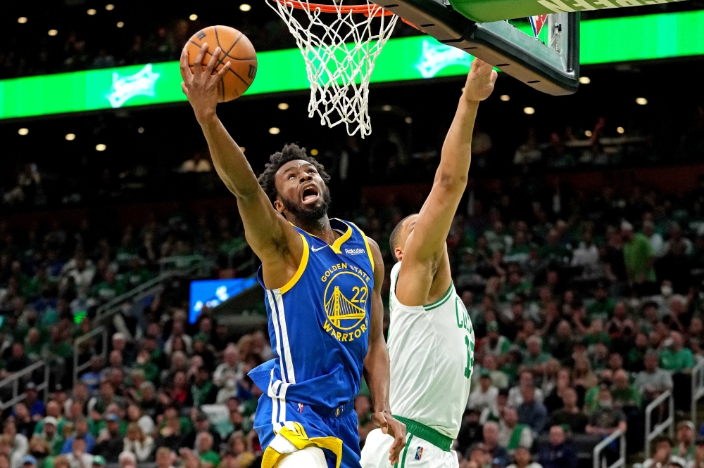 Golden State Warriors forward Andrew Wiggins (22) shoots the ball against Boston Celtics forward Grant Williams (12) during the second quarter in game six of the 2022 NBA Finals at TD Garden. Mandatory Credit: Kyle Terada-USA TODAY Sports/File Photo