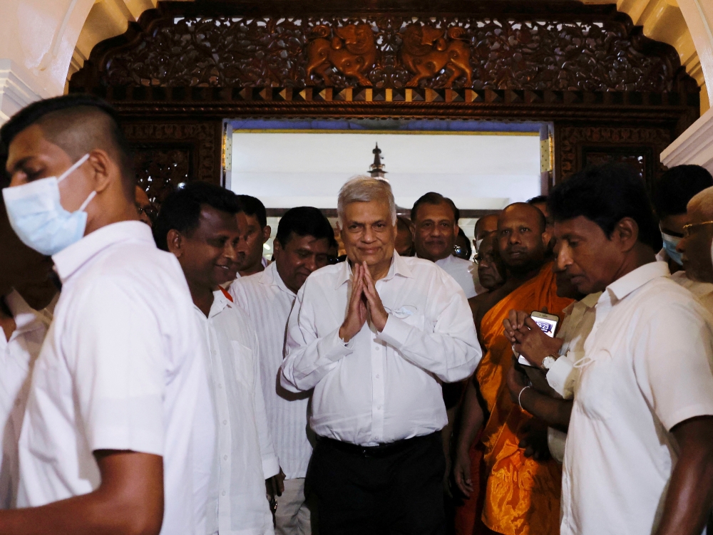 Ranil Wickremesinghe who has been elected as the Eighth Executive President under the Constitution leaves a Buddhist temple, amid the country's economic crisis, in Colombo, Sri Lanka July 20, 2022. REUTERS/ Dinuka Liyanawatte