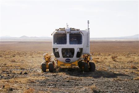 File photo: A lunar rover vehicle that US space agency NASA is testing goes through its paces in Black Point, Arizona, October 24, 2008. (Reuters)