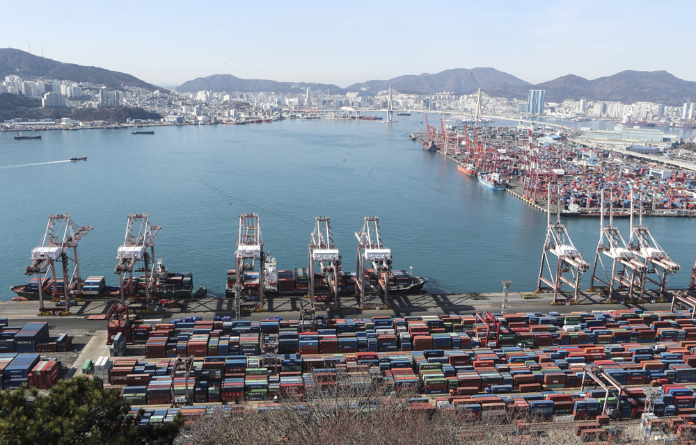 Containers are stacked up for outbound shipments at Gamman Pier in Busan.