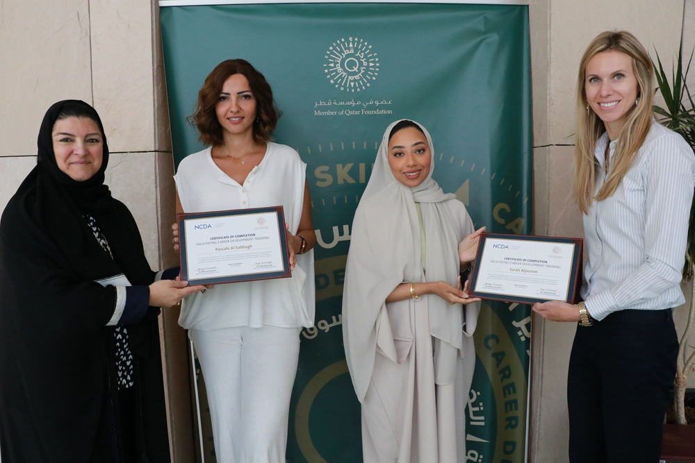 QCDC’s National Career Development Association certified instructor Dr. Hamda Al Naimi with other officials and programme participants.