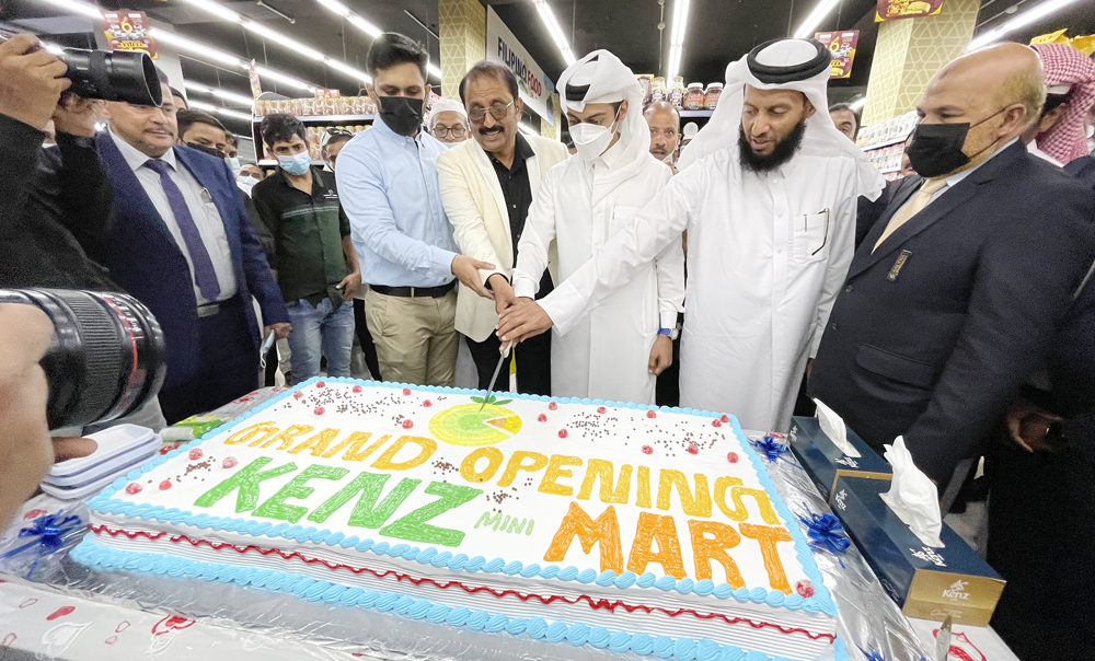 Officials during the opening of Kenz Mini Mart in Matar Qadeem.