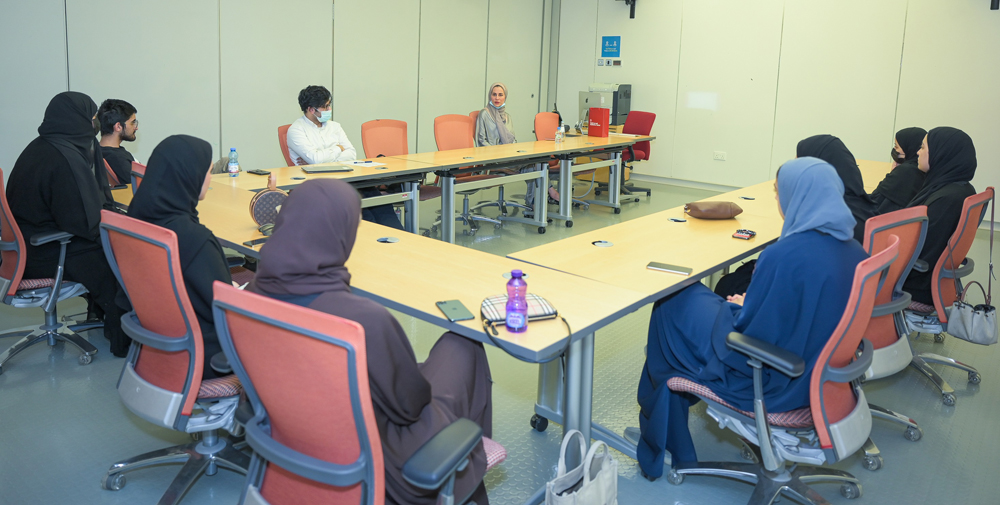 Dr. Sara Alkhawaga talking to medical students during the career advising seminar.