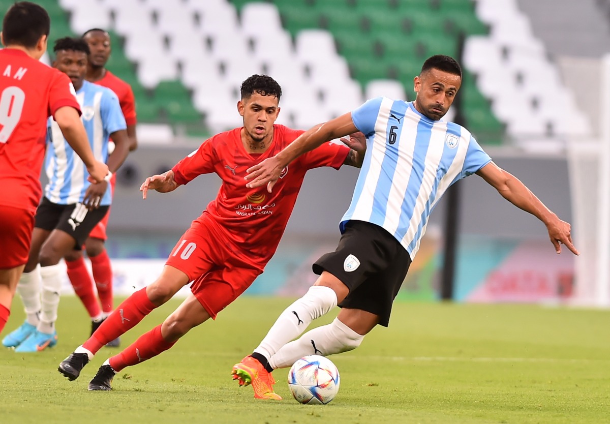 Al Wakrah’s Omid Amir Ebrahimi in action against Paulo Edmilson during their QSL match at the Education City Stadium yesterday. PIC: Abdul Basit  