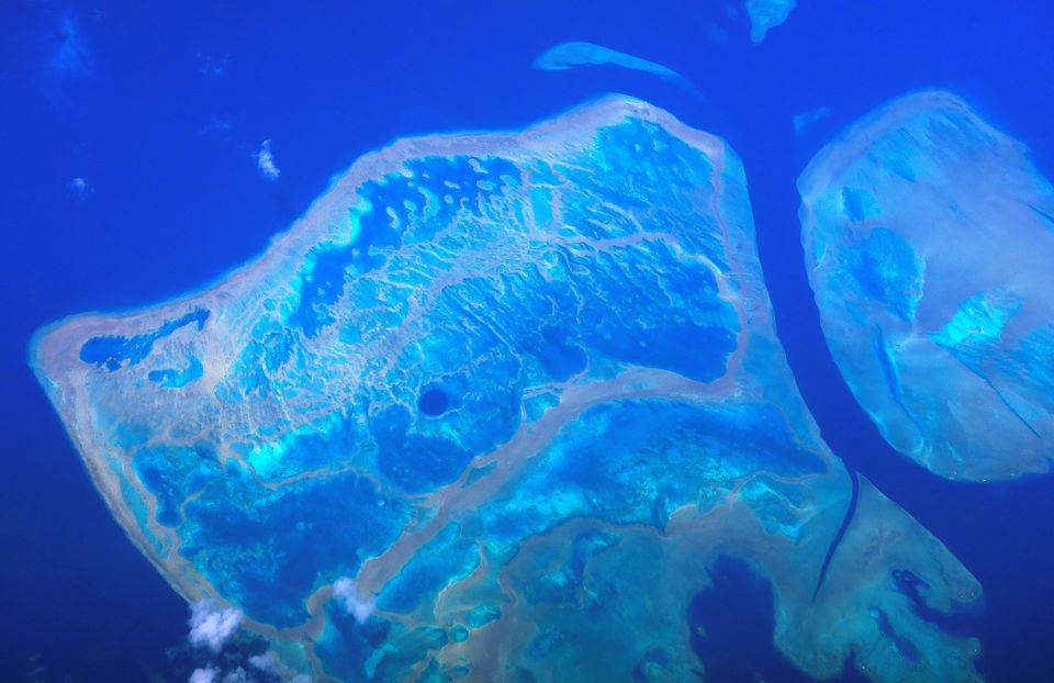 Coral reefs can be seen from above on the Great Barrier Reef, located off the coast of Queensland, near the town of Rockhampton, in Australia, November 15, 2018. REUTERS/David Gray

