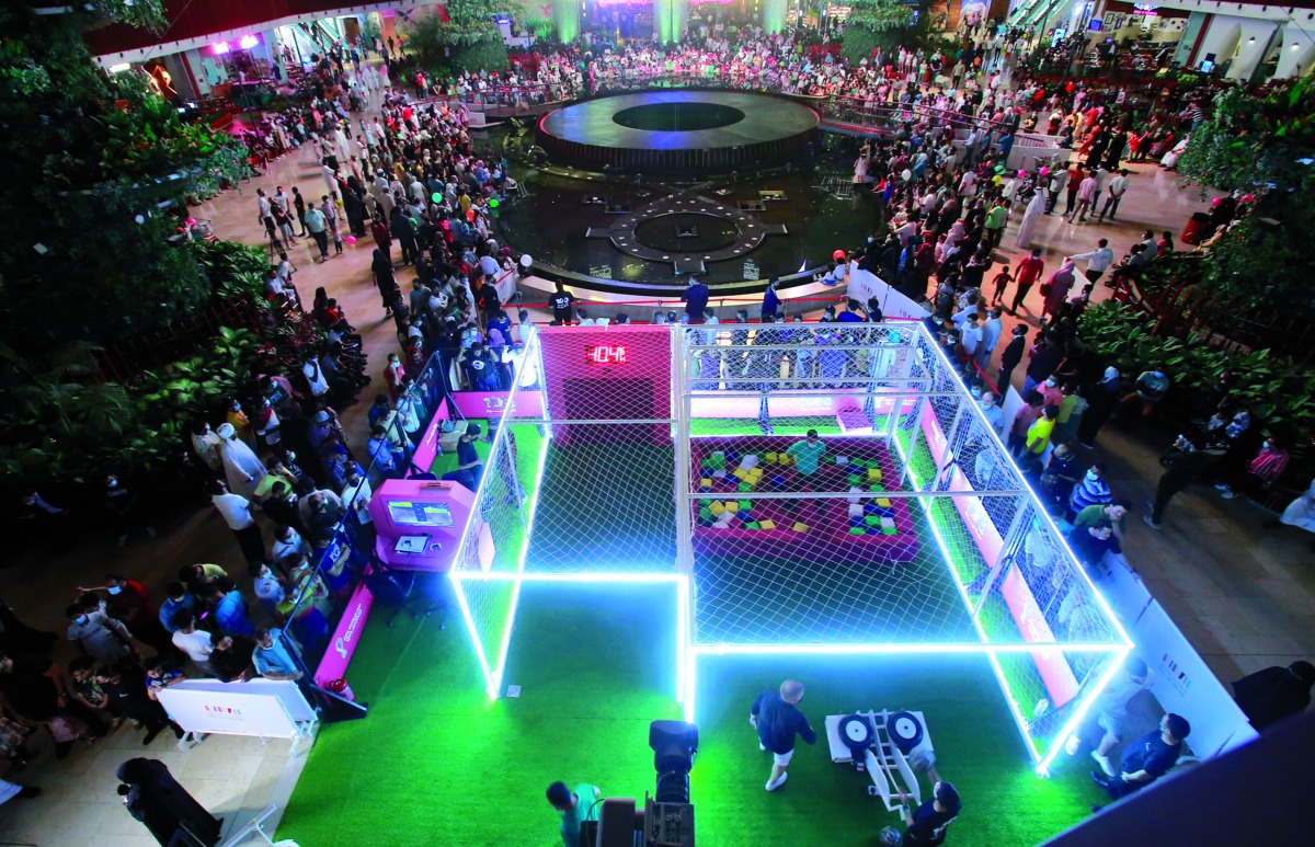 Football fans taking part in activities to mark the 100-day countdown to FIFA World Cup Qatar 2022 at Mall of Qatar yesterday. Pic: Rajan Vadakkemuriyil 