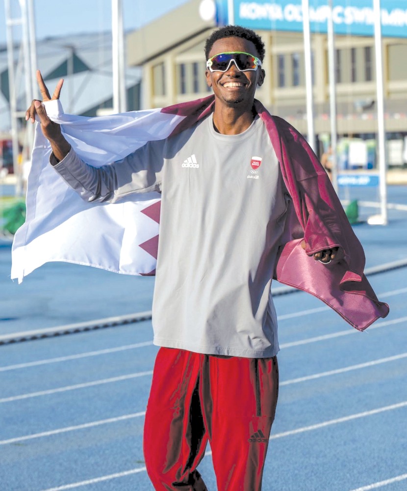 Qatar's Hamdi Ali celebrates after winning the gold medal in the men's high jump final during the Islamic Solidarity Games at the Konya Metropolitan Stadium in Konya, Turkiye, yesterday.