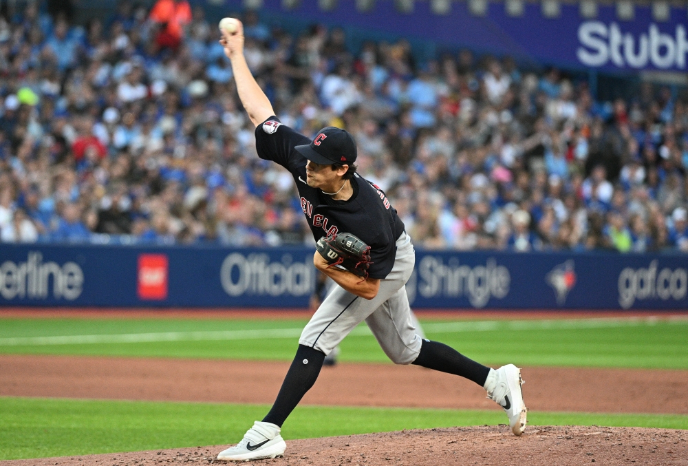 Cleveland Guardians starting pitcher Cal Quantrill (47) delivers a pitch against the Toronto Blue Jays in the third inning at Rogers Centre. Dan Hamilton-USA TODAY Sports