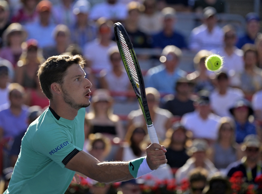 Pablo Carreno Busta (ESP) volleys against Hubert Hurkacz (POL) (not pictured) in the singles finals match during the National Bank Open at IGA Stadium. Mandatory Credit: Eric Bolte-USA TODAY Sports