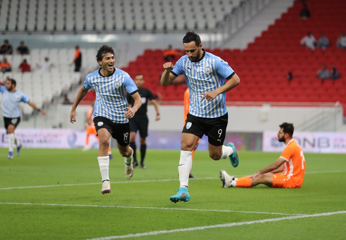 Al Wakrah's Mohamed Benyettou (right) celebrates after scoring their first goal against Umm Salal.