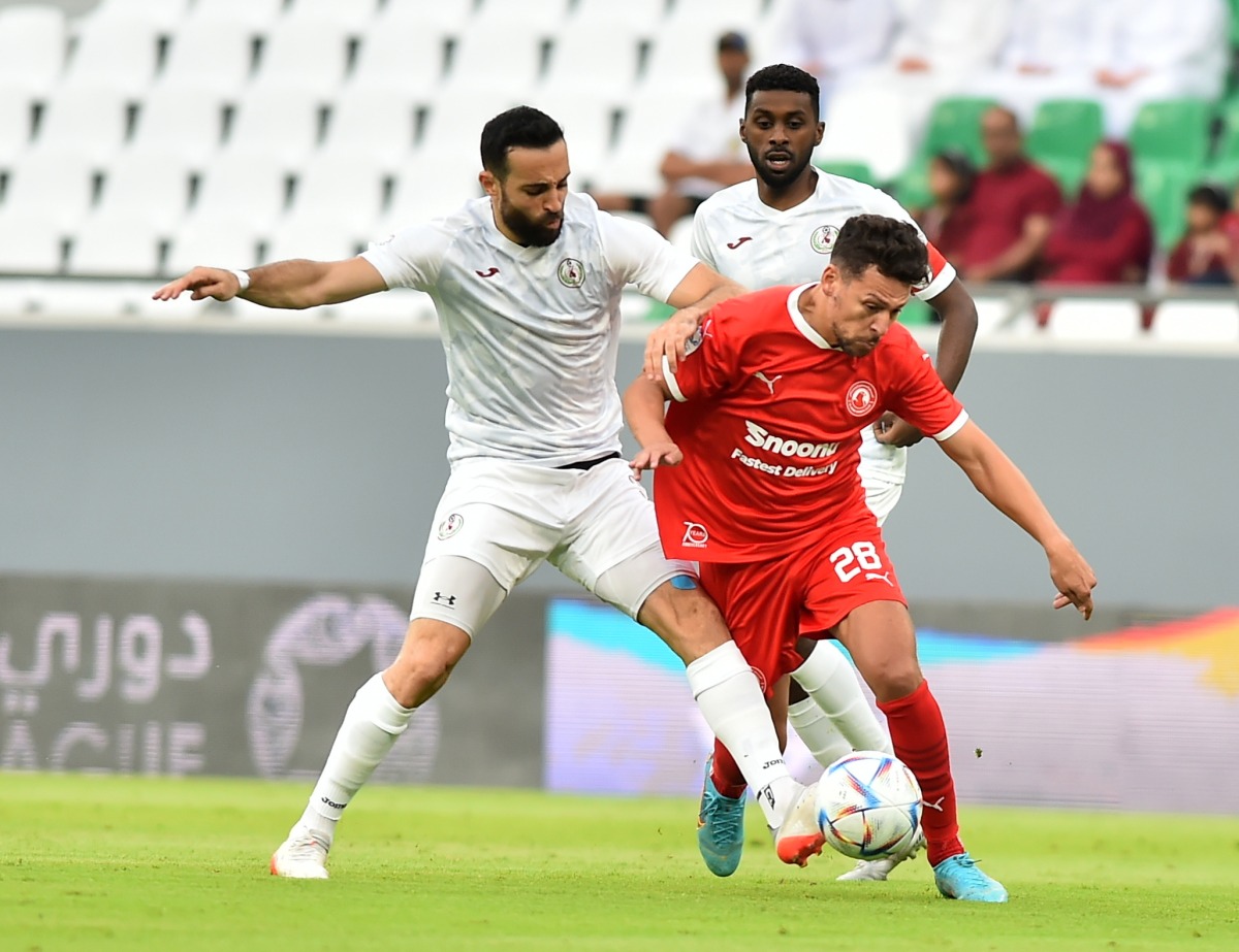 Al Arabi’s Youssef Msakani (right) in action during match against Al Markhiya. Pic: Abdul Basit  