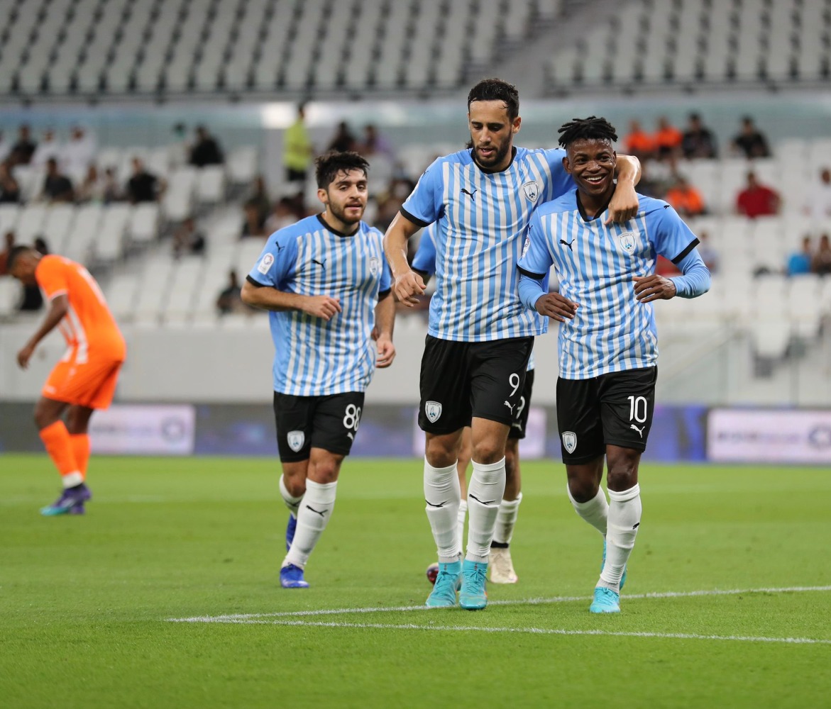 Al Wakrah players celebrate a goal during their QSL match against Umm Salal last week. 