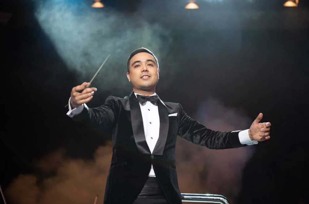 Conductor Kamoliddin Urinbaev during a  concert.