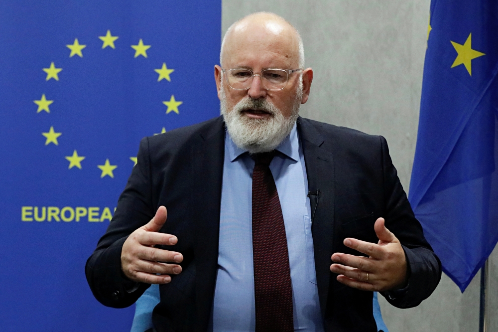 Frans Timmermans, European Commission Executive Vice President and European Commissioner for the European Green Deal gestures as he speaks during an interview at EU Delegation office in Jakarta, Indonesia, October 18, 2021. REUTERS/Ajeng Dinar Ulfiana/File Photo