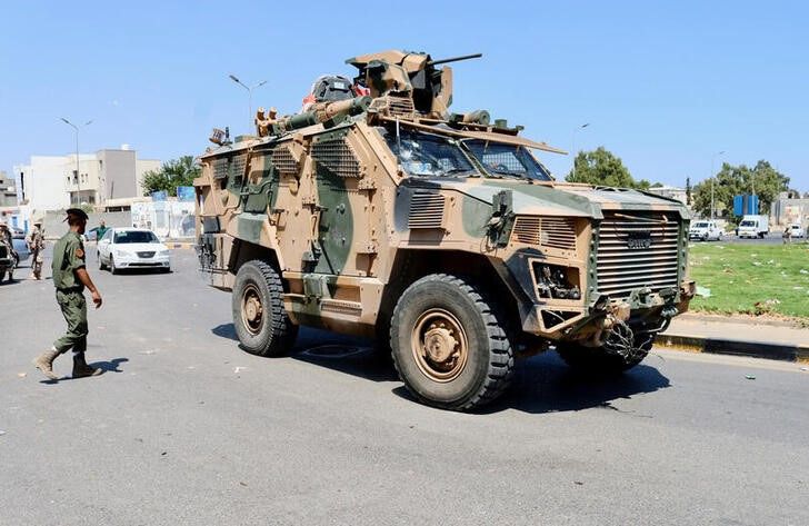 A military vehicle belonging to the Libyan armed unit, 444 Brigade, backing the Government of National Unity (GNU) and its Prime Minister Abdulhamid al-Dbeibah, drives in Ain Zara area in Tripoli, Libya, on July 22, 2022. REUTERS/Hazem Ahmed