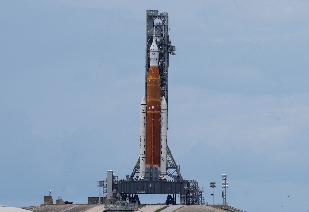 A view of NASA's next-generation moon rocket, the Space Launch System (SLS) rocket with its Orion crew capsule perched on top, as it stands on launch pad 39B in preparation for the unmanned Artemis 1 mission at Cape Canaveral, Florida, U.S. August 28, 2022. REUTERS/Joe Skipper