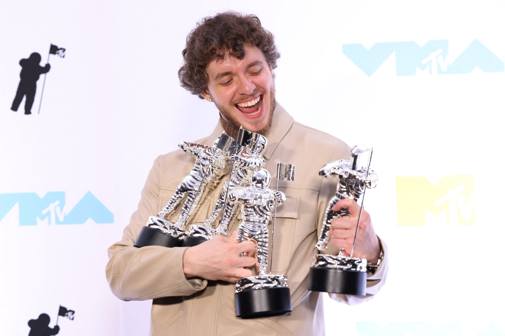 Jack Harlow poses backstage with his awards at the 2022 MTV Video Music Awards at the Prudential Center in Newark, New Jersey, U.S., August 28, 2022. Reuters/Caitlin Ochs