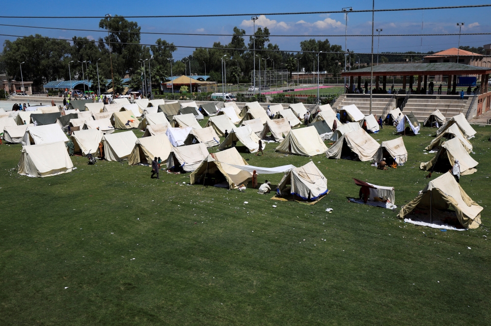 A general view of relief camps established for the flood victims following rains and floods during the monsoon season in Charsadda, Pakistan, on August 28, 2022. REUTERS/Fayaz Aziz
