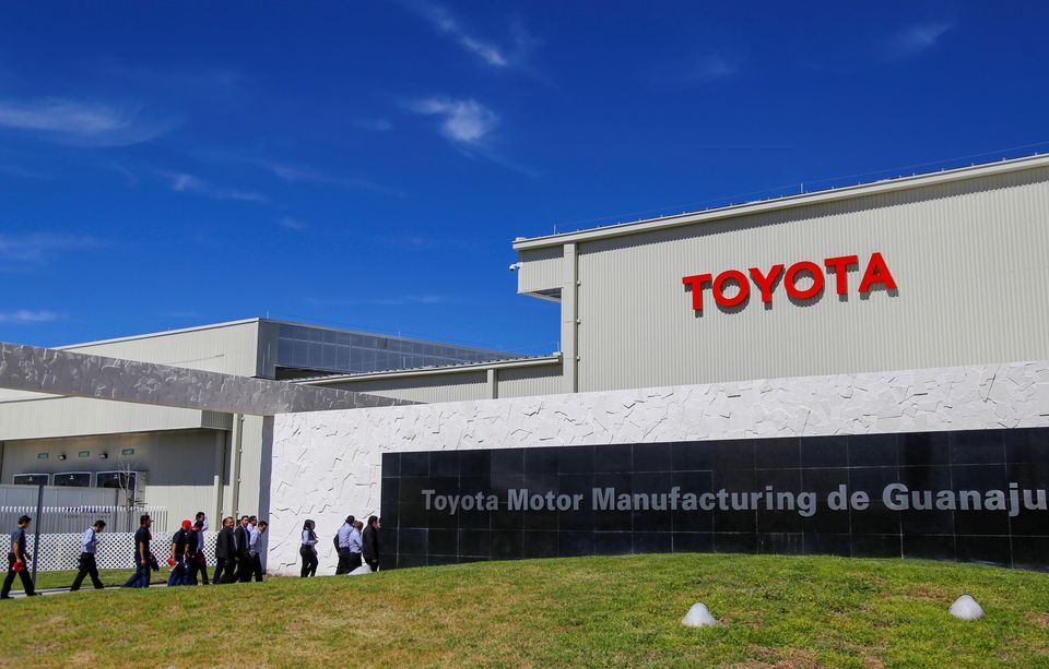 Employees walk at the Toyota Motor Corp new plant in Apaseo El Grande in Mexico's central state of Guanajuato, Mexico February 6, 2020. REUTERS/Sergio Maldonado
