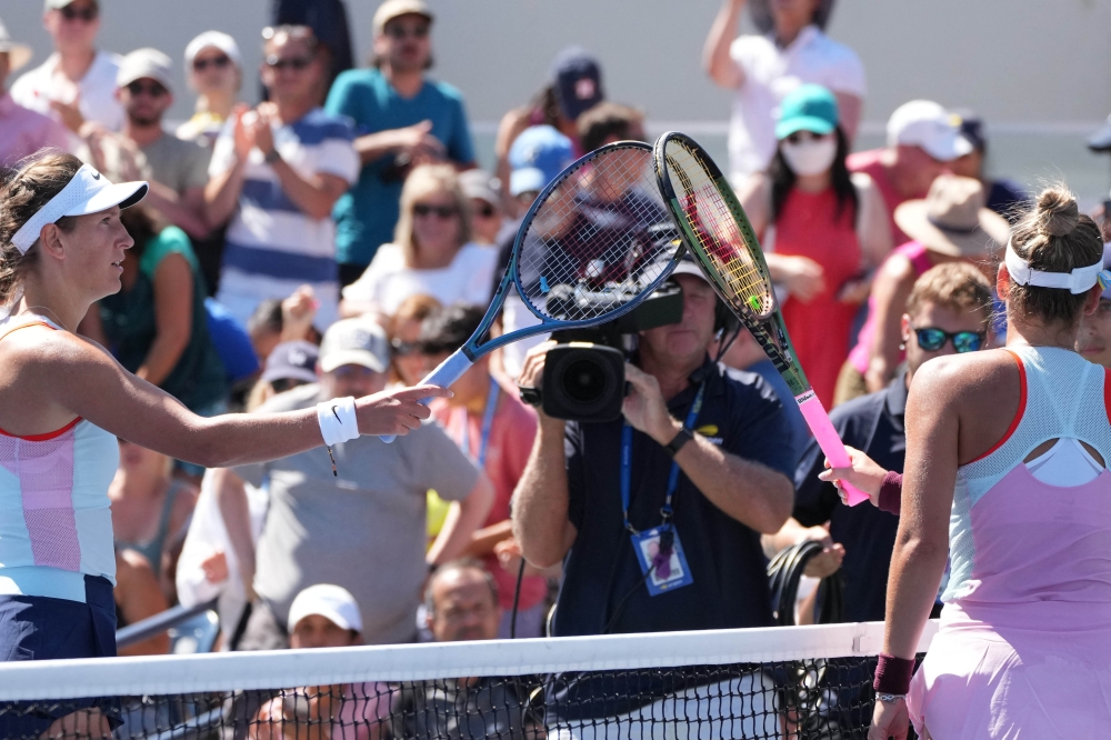 Victoria Azarenka (left) greets Marta Kostyuk of Ukraine after their second round match on day four of the 2022 US Open tennis tournament at USTA Billie Jean King Tennis Center at Flushing, New York, on September 1, 2022.   Mandatory Credit: Jerry Lai-USA TODAY Sports