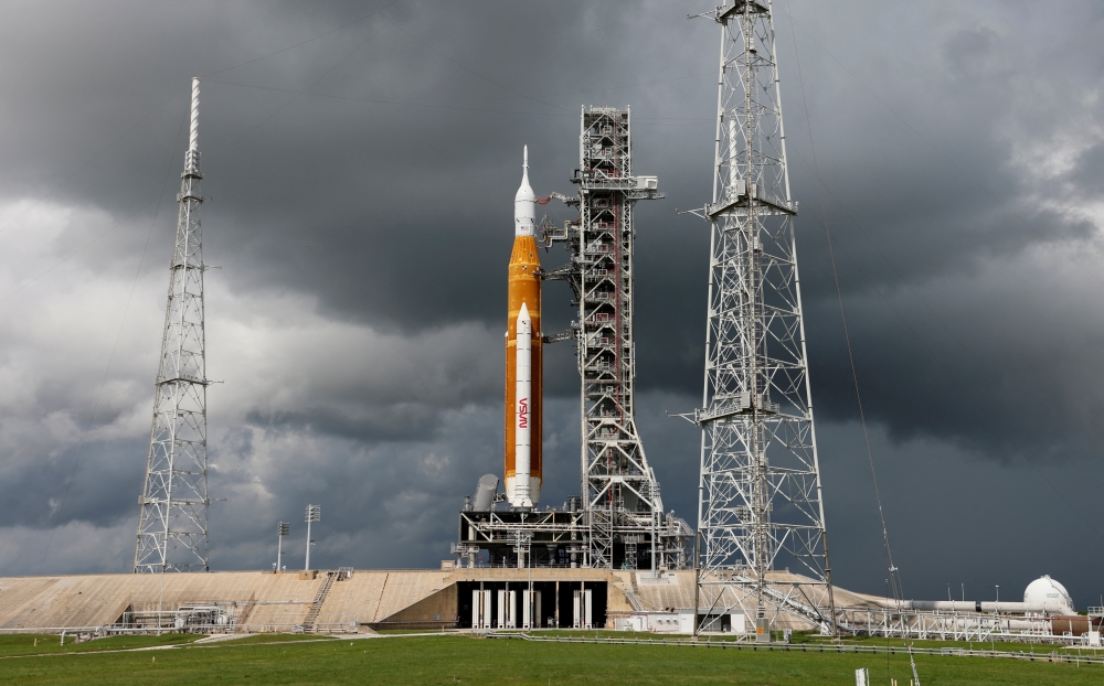 NASA's next-generation moon rocket, the Space Launch System (SLS) with the Orion crew capsule perched on top, stands on launch complex 39B as rain clouds move into the area before its rescheduled debut test launch for the Artemis 1 mission at Cape Canaveral, Florida, US, September 2, 2022. (REUTERS/Joe Skipper)