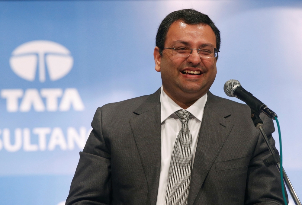 File photo of Cyrus Mistry, chairman of Tata Group, smiles during the Tata Consultancy Services Ltd. (TCS) annual general meeting in Mumbai June 27, 2014. Reuters 