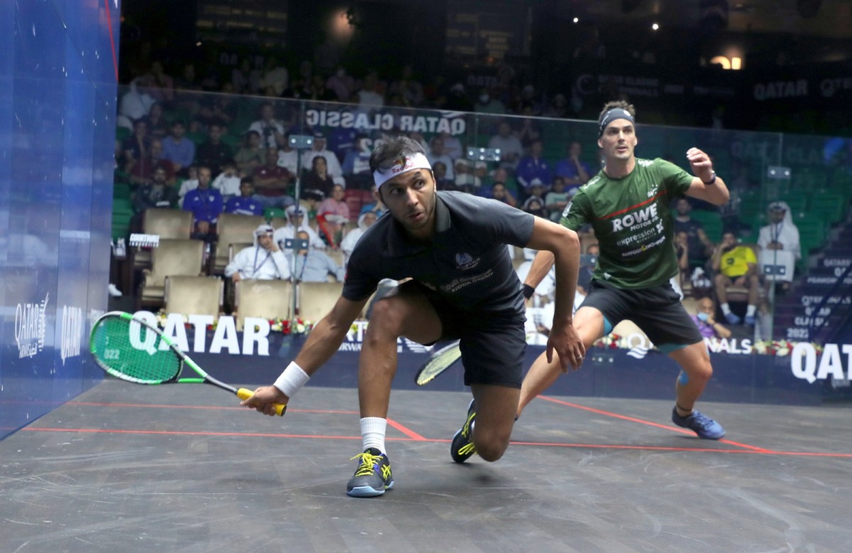 Qatar’s Abdulla Mohamed Al Tamimi in action against New Zealand's Paul Coll. 