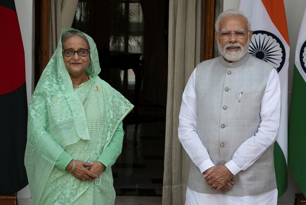 Bangladesh's Prime Minister Sheikh Hasina and her Indian counterpart Narendra Modi pose during a photo opportunity ahead of their meeting at Hyderabad House in New Delhi, India September 6, 2022. Reuters/Adnan Abidi