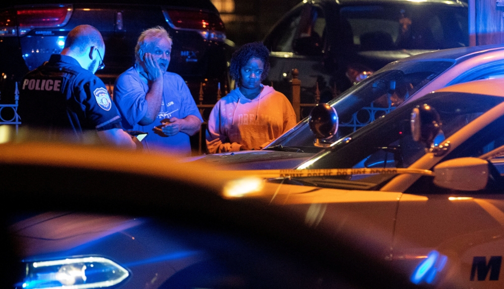 Memphis police officers work at one of multiple crime scenes they believe were committed by a man driving around shooting in Memphis, Tennessee, U.S. September 7, 2022. Christine Tannous/USA Today Network via Reuters