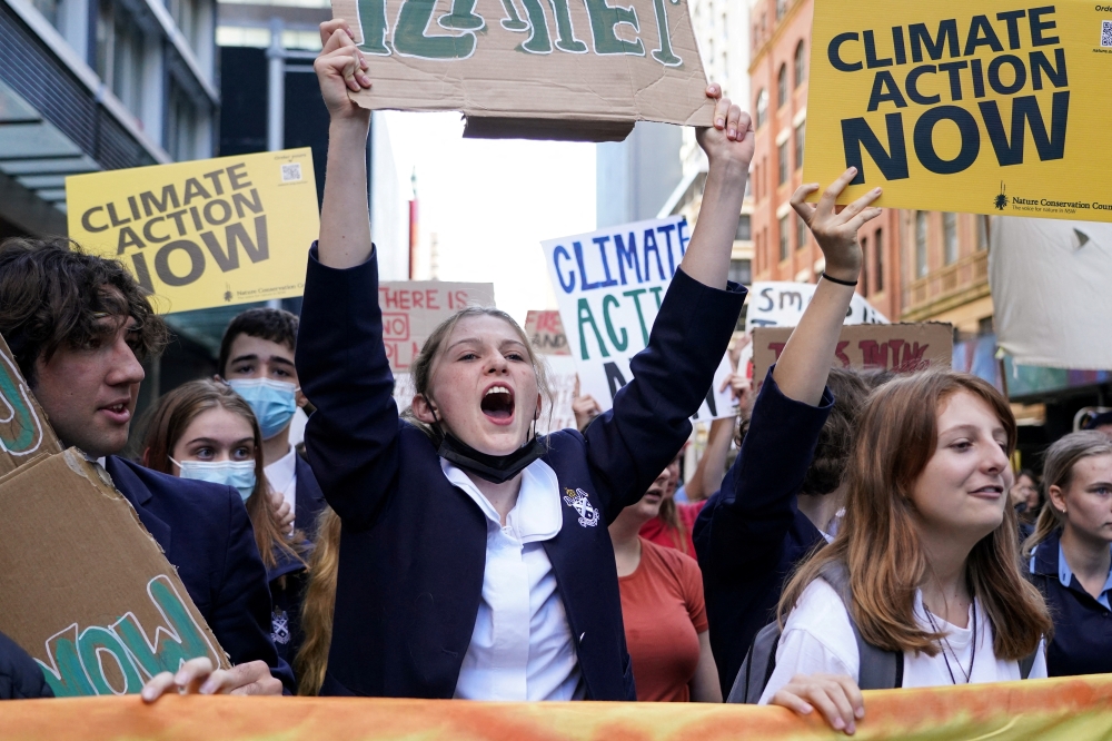 File photo; students strike to demand further action on climate change ahead of the national election, in Sydney, Australia, May 6, 2022. Reuters/Loren Elliott/File Photo