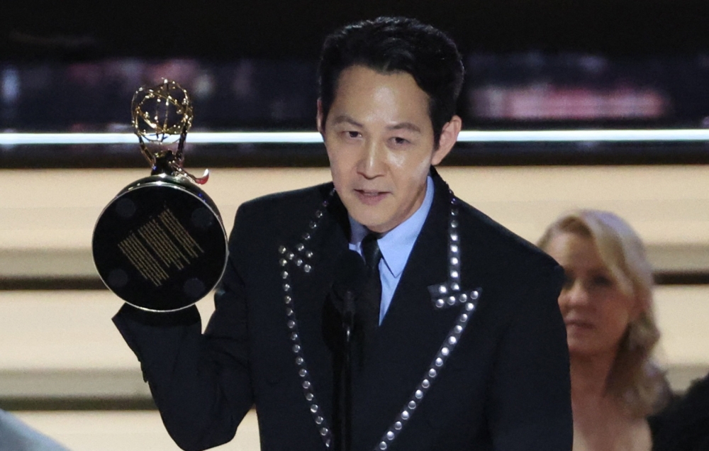 Lee Jung-jae accepts the award for Outstanding Lead Actor In A Drama Series for 