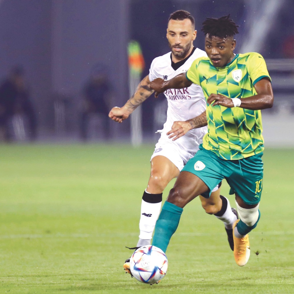 Al Wakrah's Jacinto Dala and Al Sadd's Guilherme Torres in action during yesterday's match. Pic: Mohamed Farag