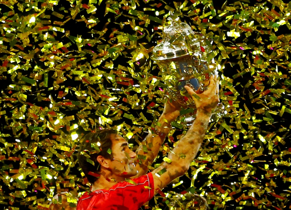 October 27, 2019 Switzerland's Roger Federer celebrates with the trophy after winning the final against Australia's Alex de Minaur REUTERS/Arnd Wiegmann/File Photo