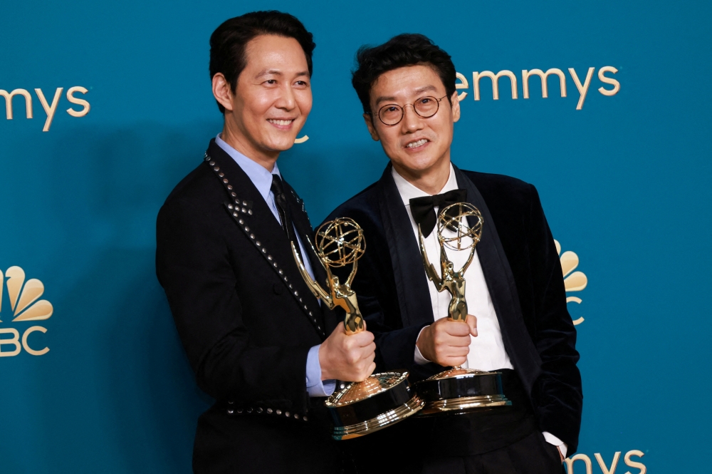 Lee Jung-jae holds his Emmy for Outstanding Lead Actor In A Drama Series for 