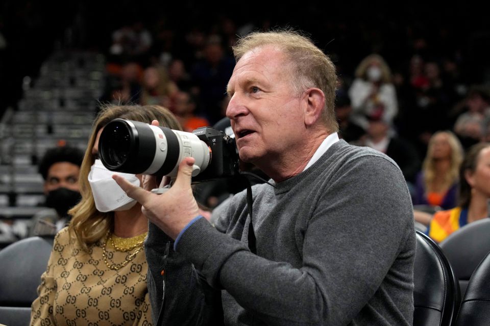 Phoenix Suns owner Robert Sarver takes images during a game against the Houston Rockets at Footprint Center, Phoenix, Arizona, on February 16, 2022. (Rick Scuteri-USA TODAY via Reuters)