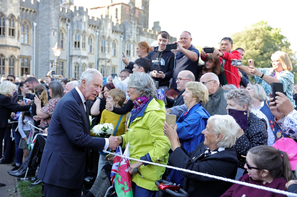 King Charles III meets with members of the public at Cardiff Castle in Cardiff, Wales, on September 16, 2022. (Chris Jackson via REUTERS)