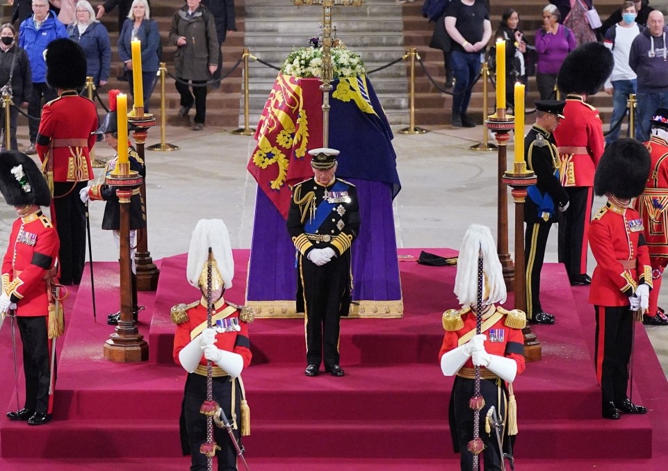 King Charles III, the Princess Royal, the Duke of York and the Earl of Wessex hold a vigil beside the coffin of their mother, Queen Elizabeth II, as it lies in state on the catafalque in Westminster Hall, at the Palace of Westminster, London, on September 16, 2022. (Yui Mok/Pool via REUTERS)