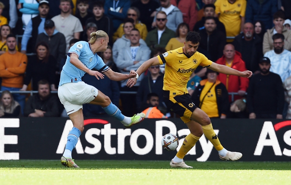 Manchester City's Erling Braut Haaland scores their second goal against Wolverhampton Wanderers at the Molineux Stadium in Wolverhampton on September 17, 2022.  REUTERS/Peter Powell