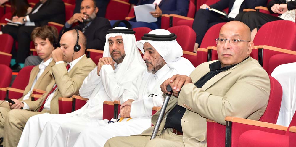 Hassan bin Rashid Al Derham, President of Qatar University, with other officials during the conference.