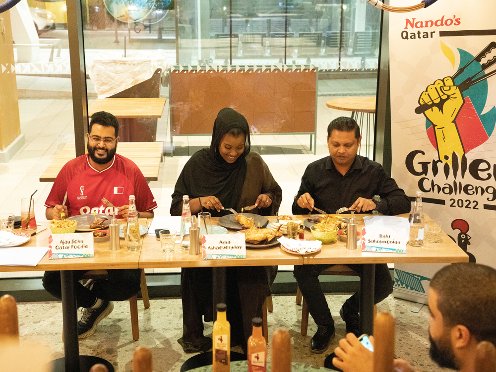 Qatar Foodie, Ashaeveryday and Balu Subramonian on the judging panel at Nando’s Qatar’s Master Grillers’ 2022 finals.