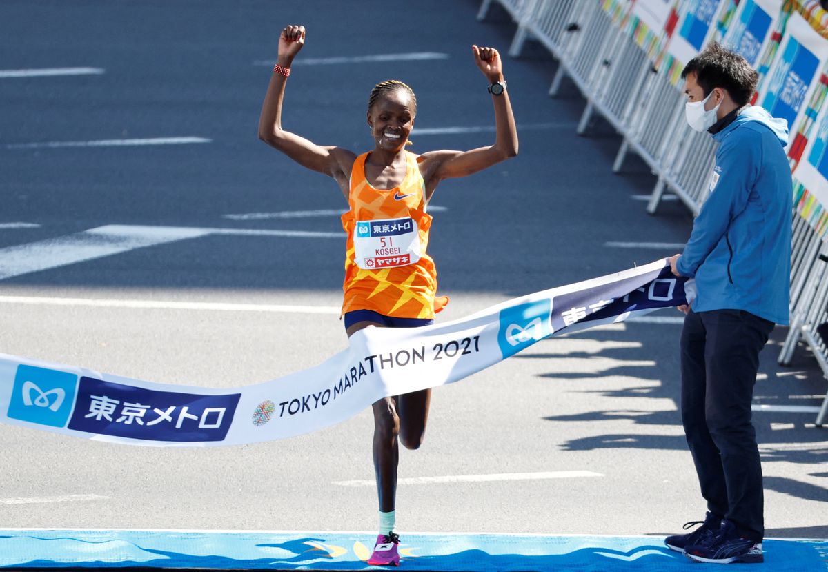 Brigid Kosgei of Kenya crosses the line to win the women's elite race at the Tokyo Marathon 2021 in Tokyo, Japan, on March 6, 2022. (REUTERS/Kim Kyung-Hoon)