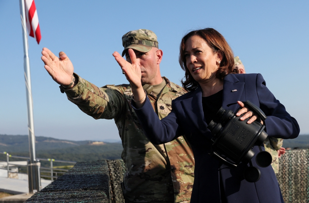 US Vice President Kamala Harris stands at military observation post as she visits the demilitarized zone (DMZ) separating the two Koreas, in Panmunjom, South Korea, on September 29, 2022. (REUTERS/Leah Millis)