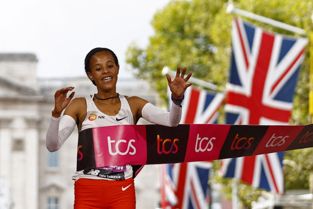 October 2, 2022 Ethiopia's Yalemzerf Yehualaw crosses the line to win the women's elite race Action Images via Reuters/Andrew Boyers