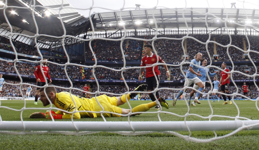 Manchester City's Erling Braut Haaland scores their fifth goal past Manchester United's David de Gea during the EPL match at the Etihad Stadium, Manchester, on October 2, 2022. REUTERS/Phil Noble 