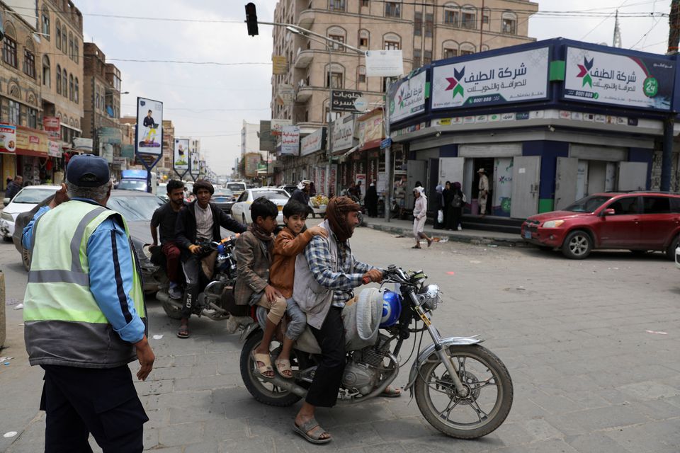 People ride on motorbikes on a street in Sanaa, Yemen, on August 1, 2022. File Photo / Reuters
